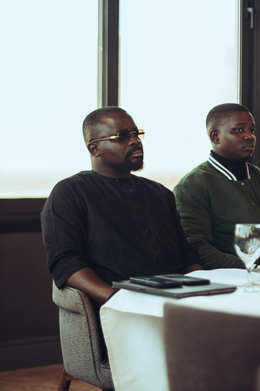 Team discussing around a table in a meeting room